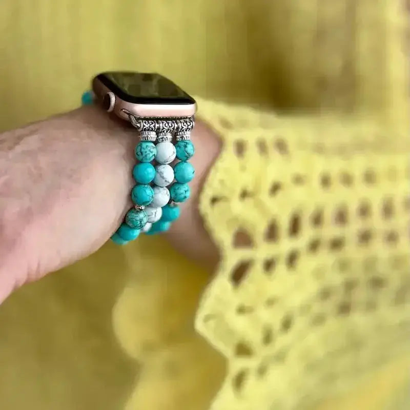 Woman's wrist with turquoise bead apple watch band